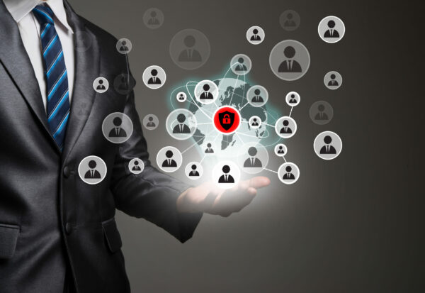 Businessman hand with people icons network connection. Business communication concept.